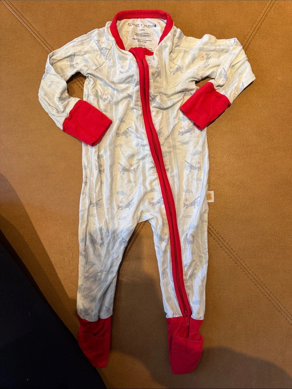 Toast + Jams Cream Airplane Footie with Red bamboo stretch pajamas 2 way zip